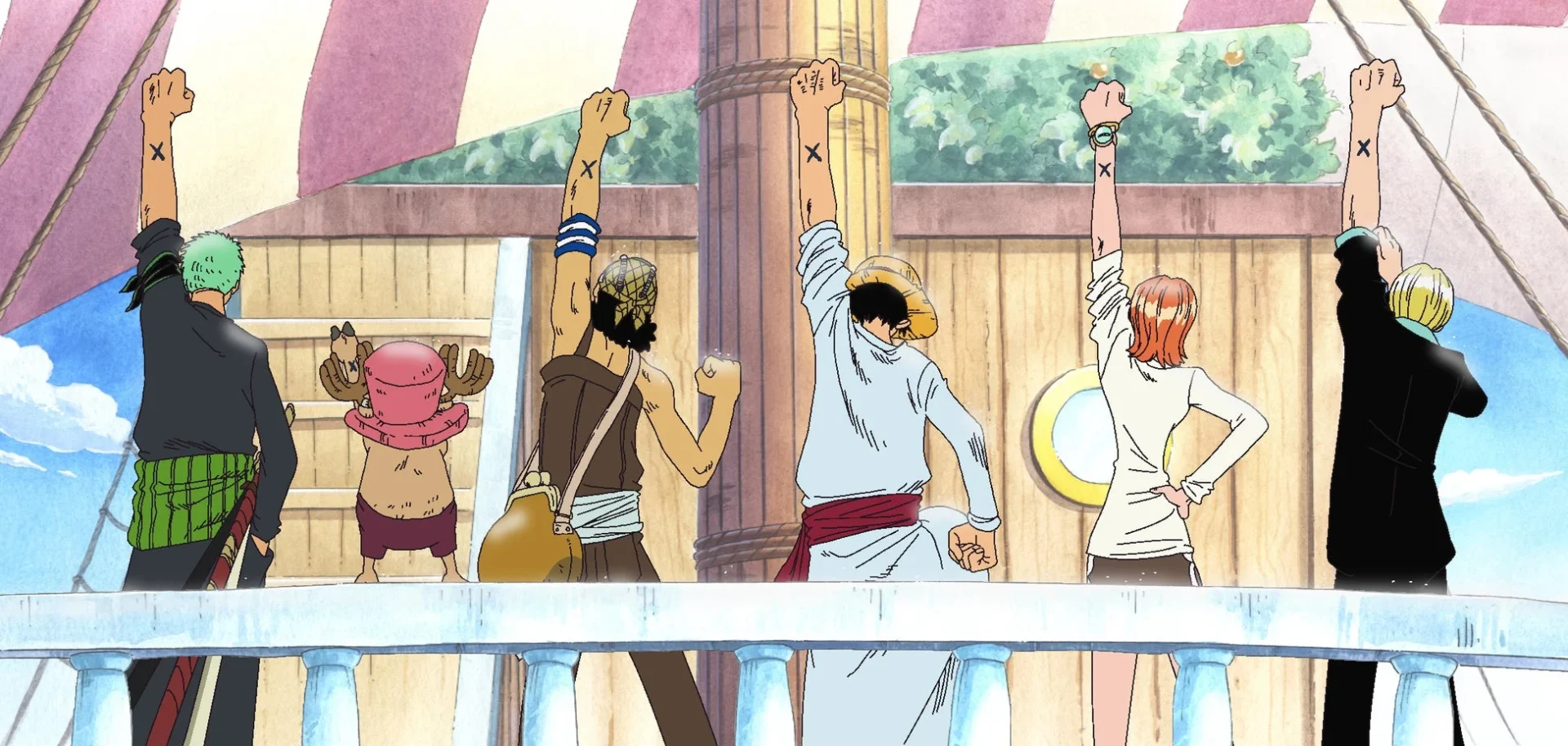 船上で左腕にXマークを掲げる麦わらの一味の後ろ姿